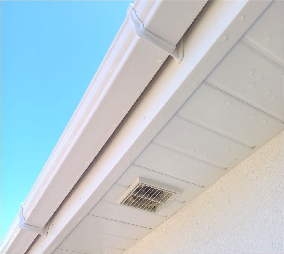 Clean white gutter and soffit after gutter cleaning in Lymington